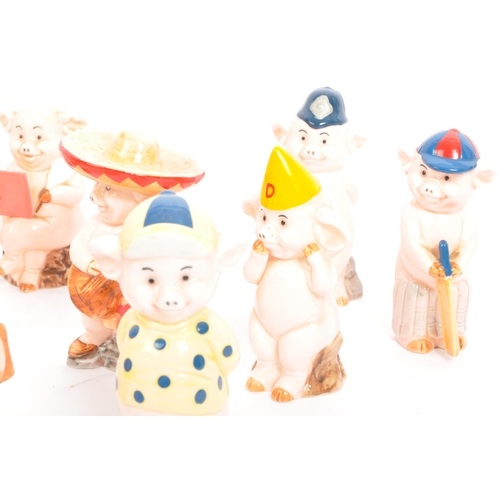 27 - A collection of x17 vintage Danbury Mint ' collectible ' Piggies ' figurines to include Piggie Banke... 