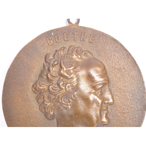 280 - A 19th century continental bronze plaque cast into relief depicting Goethe. Complete with hanging ba... 