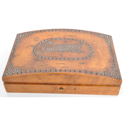 284 - A 19th century Satinwood studded trinket jewellery box with central cartouche marked to centre with ... 