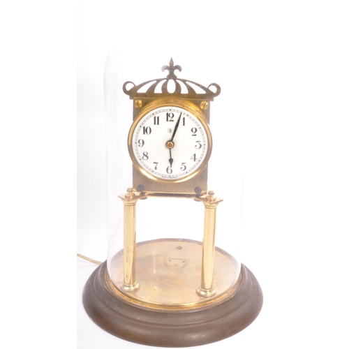 308 - A pair of vintage 20th century anniversary clocks to include a German example in glazed square case ... 