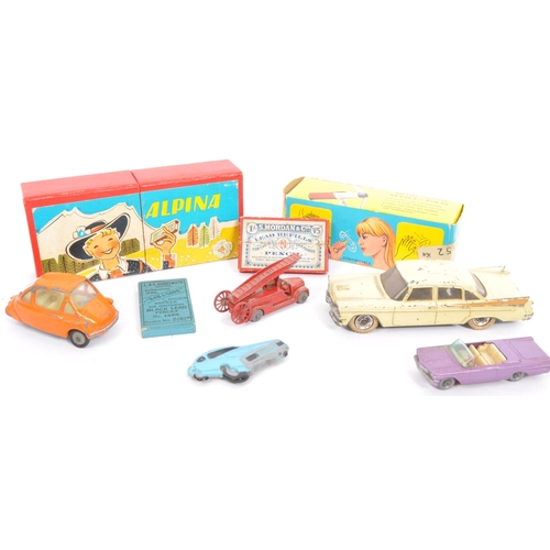 309 - A collection of items to include Dinky Heinkel, Dinky Dodge Royal Sedan, Lesney Pontiac Convertable ... 