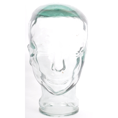 318 - A vintage 20th century pressed glass milliners / phrenology type head bust having moulded features.