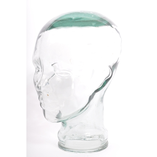 318 - A vintage 20th century pressed glass milliners / phrenology type head bust having moulded features.