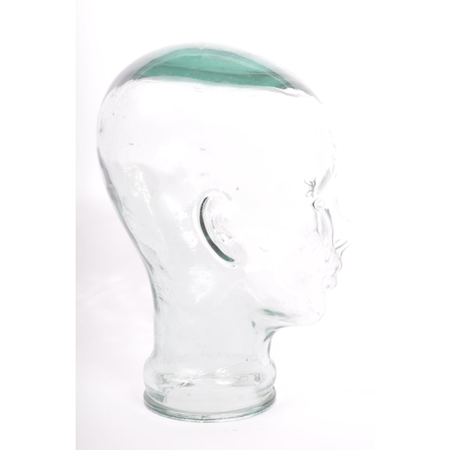 318 - A vintage 20th century pressed glass milliners / phrenology type head bust having moulded features.