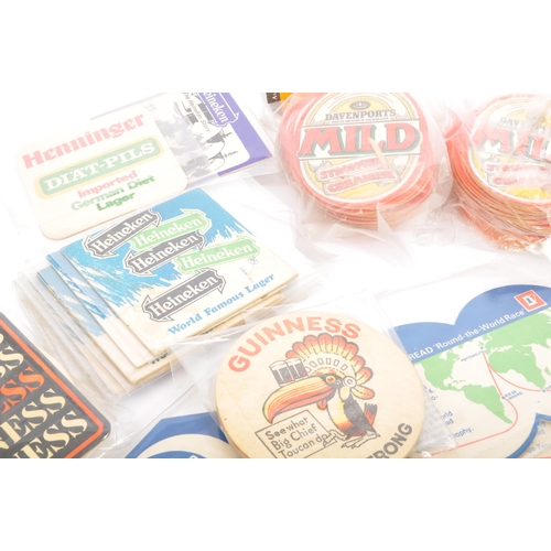 331 - Breweriana interest - A collection of vintage 20th century pub bar beer mats. Including such brands;... 