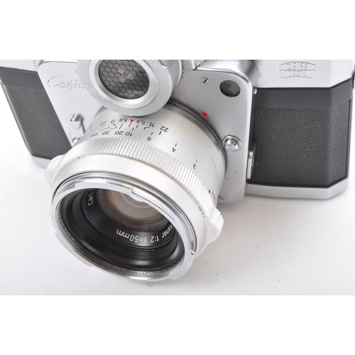 340 - A Zeiss Ikon Contarex Bulls Eye SLR Camera,Â with Carl Zeiss Planar 1:2 f= 50mm lens Nr3249532. In b... 