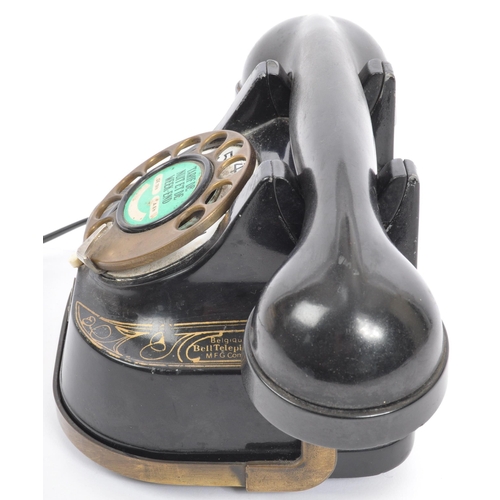 357 - An early 20th century metal gilded Belgium Telephone Company telephone marked 'Tarif De Nuit Et De W... 