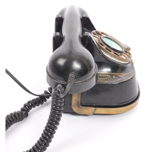 357 - An early 20th century metal gilded Belgium Telephone Company telephone marked 'Tarif De Nuit Et De W... 