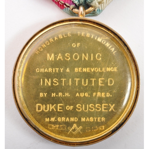 365 - A Masonic regalia medal with lanyard. Engraving reads Honorable Testimonial of Masonic charity & Ben... 