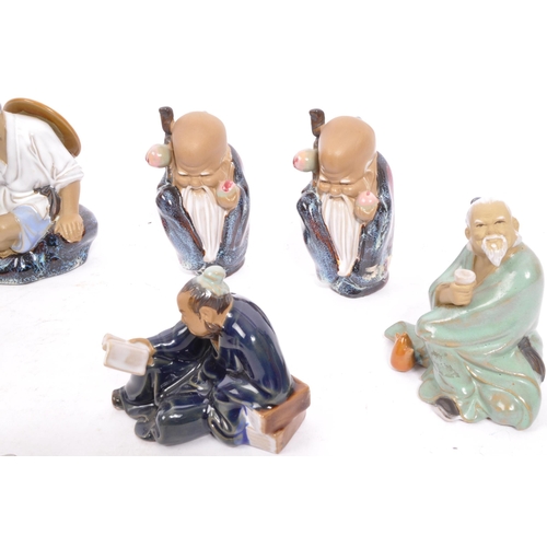 38 - A collection vintage 20th century pottery ceramic Shiwan / Wanjiang Chinese mud men. Comprising of, ... 