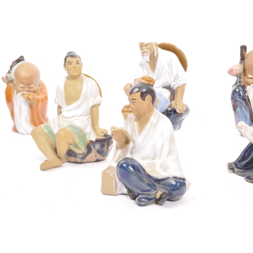 38 - A collection vintage 20th century pottery ceramic Shiwan / Wanjiang Chinese mud men. Comprising of, ... 