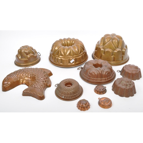 391 - A collection of 19th century copper jelly moulds to include a Christian Wagner alongside a variety o... 