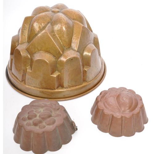 391 - A collection of 19th century copper jelly moulds to include a Christian Wagner alongside a variety o... 