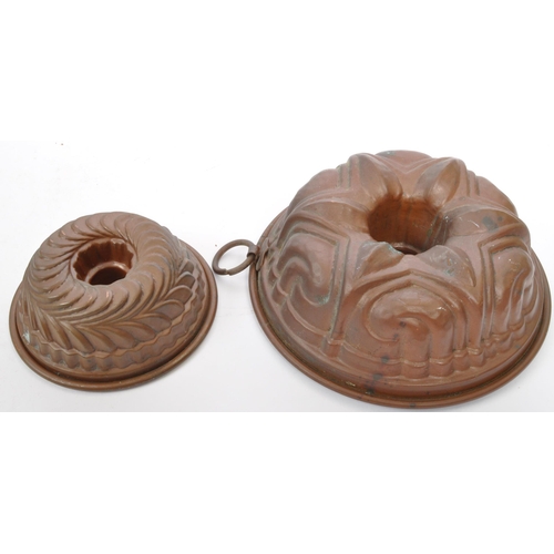 391 - A collection of 19th century copper jelly moulds to include a Christian Wagner alongside a variety o... 