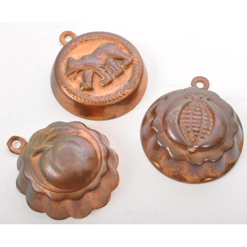 391 - A collection of 19th century copper jelly moulds to include a Christian Wagner alongside a variety o... 