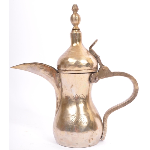 392 - A collection of 19th century copper to include an Afghani teapot incised with vignettes featuring fi... 