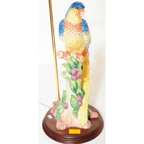 41 - A contemporary Meissen style parrot table light lamp base. With polychrome painted ceramic parrot on... 