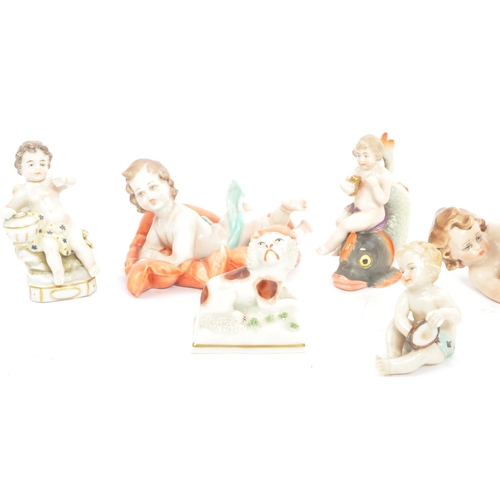 5 - A group of seven early 20th Century Capodimonte Naples ceramic figurines in the form of babies, infa... 