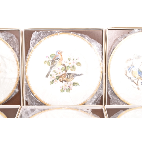 53 - A large set of nine late century Boehm of Malvern, 'European Bird' Plates. To include, Tree Sparrows... 