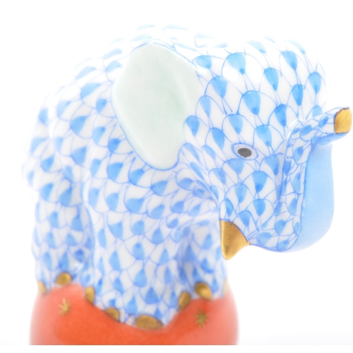 7 - Herend - A 20th century Hungarian Herend porcelain elephant figure. Hand painted with blue scalloped... 