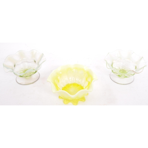 9 - A collection of 19th century Victorian uranium vaseline glass to include a pair of Davidsons Primros... 