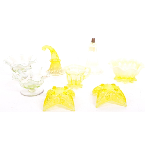 9 - A collection of 19th century Victorian uranium vaseline glass to include a pair of Davidsons Primros... 