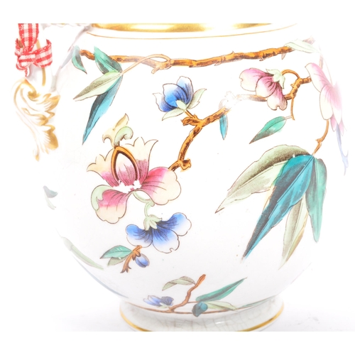 91 - A Victorian 19th century hand painted pitcher jug. The jug being hand painted with gilt details and ... 