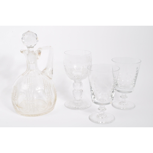 81 - A collection of 20th century cut glass to include vases, bubble control candle holders, bobbin turn ... 