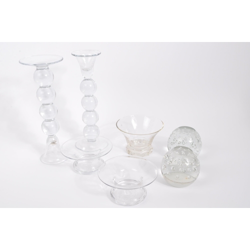 81 - A collection of 20th century cut glass to include vases, bubble control candle holders, bobbin turn ... 