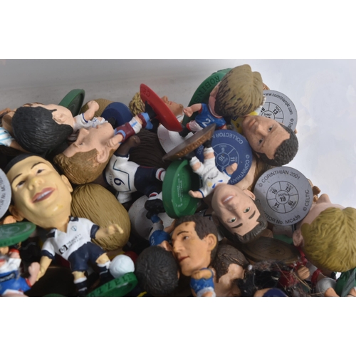 573 - A large collection of circa Corinthian ' Big Head ' football figures. Various Premier League and oth... 