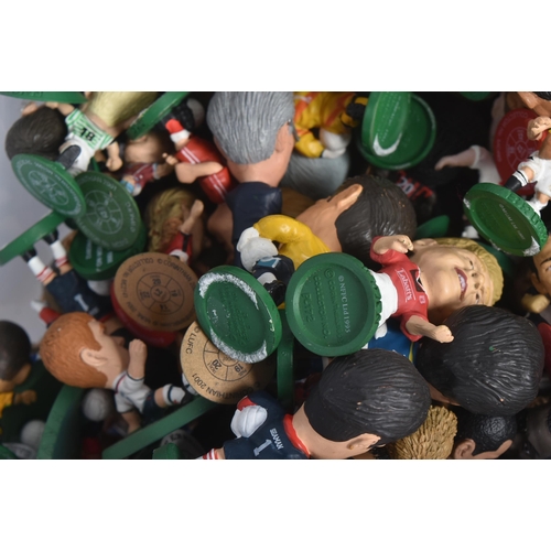 573 - A large collection of circa Corinthian ' Big Head ' football figures. Various Premier League and oth... 