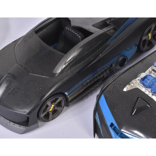 577 - Batman - a collection of assorted Batman action figures and Batmobile vehicles. Various figures from... 