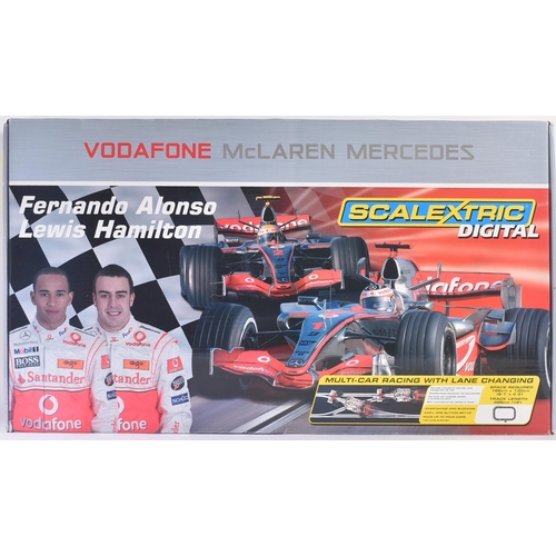 611 - An original Hornby made digital Scalextric slot car racing set No. C1214 Formula One / F1 Alonso & H... 