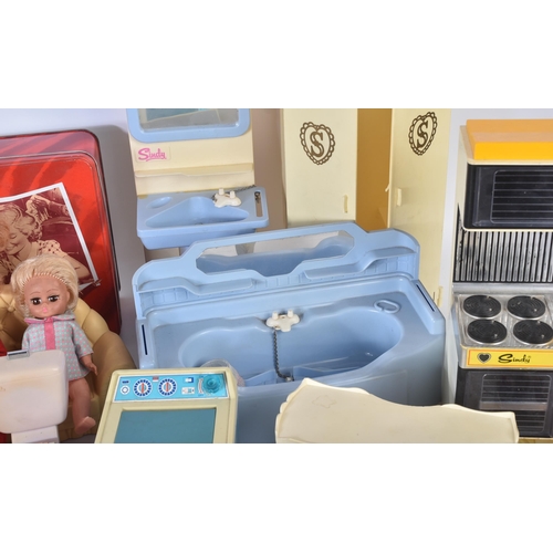 718 - Sindy - a large collection of original vintage Pedigree made Sindy dolls, furniture and accessories.... 