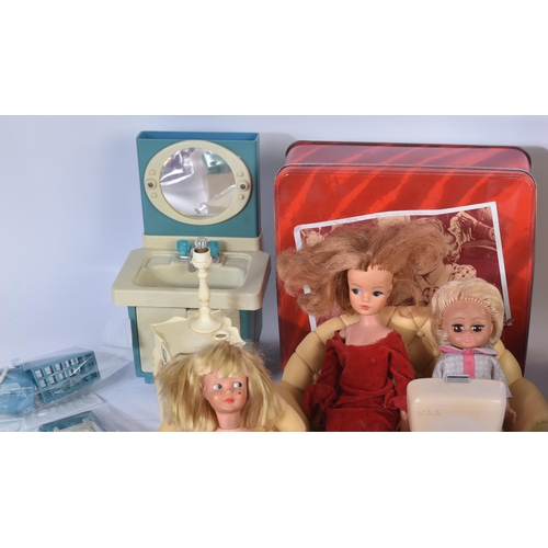 718 - Sindy - a large collection of original vintage Pedigree made Sindy dolls, furniture and accessories.... 