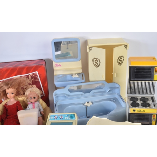 718 - Sindy - a large collection of original vintage Pedigree made Sindy dolls, furniture and accessories.... 