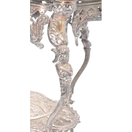 10 - A late 19th Century Continental silver plated side occasional table / wine or lamp table. Inset glas... 