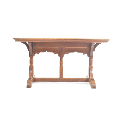 13 - A late 19th century Gothic / ecclesiastical Arts & Crafts solid oak refectory dining table in the ma... 