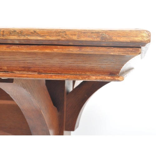 13 - A late 19th century Gothic / ecclesiastical Arts & Crafts solid oak refectory dining table in the ma... 
