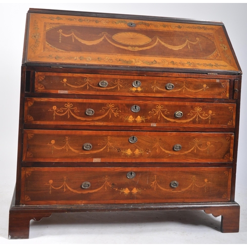 24 - An 18th century walnut and marquetry inlaid bureau bookcase. The bureau with stunning floral and swa... 
