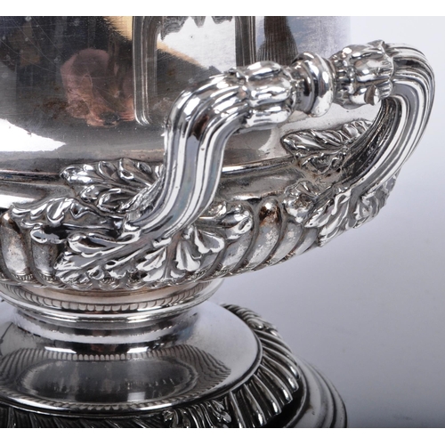 25 - A pair of 19th century Old Sheffield silver plated wine coolers in the form of urns. Each with centr... 