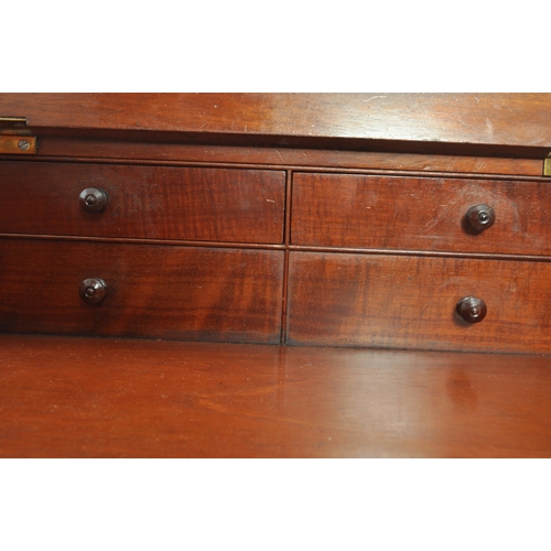 31 - A William IV 19th century mahogany davenport. The top with fitted hinged and forward sliding desk wi... 