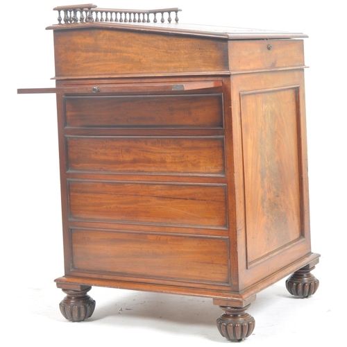31 - A William IV 19th century mahogany davenport. The top with fitted hinged and forward sliding desk wi... 