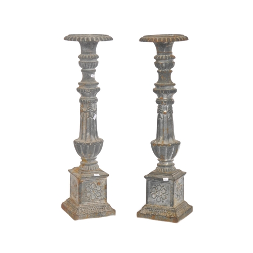 40 - A large pair of 19th century cast iron ecclesiastical large floor standing candlestick prickers. Eac... 