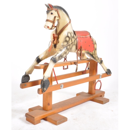 51 - A Victorian style early 20th century circa 1910s wooden child's rocking horse with red leatherette d... 