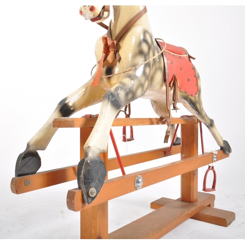 51 - A Victorian style early 20th century circa 1910s wooden child's rocking horse with red leatherette d... 