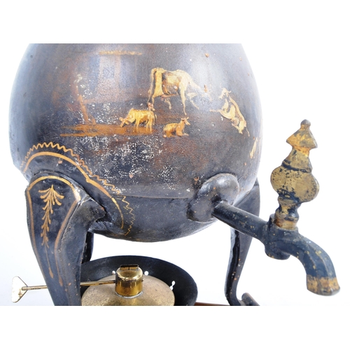 52 - A 19th century Victorian black lacquered coffee pot and stand having and ebonised finial over forest... 