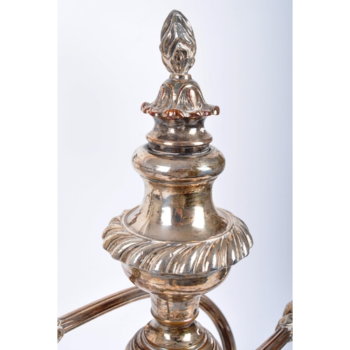 57 - A hallmarked silver pair of George III candelabra candlesticks. Hallmarked Sheffield, date letter fo... 