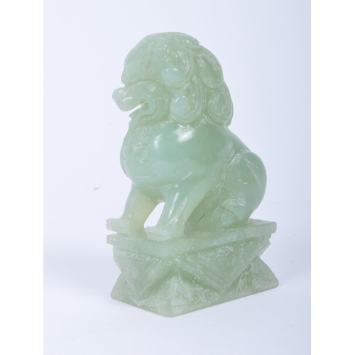 59 - An early 20th century Chinese carved jade Dog of Fo / lion / temple dog. The carving with defensive ... 