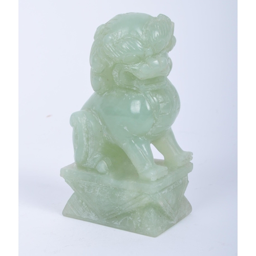 59 - An early 20th century Chinese carved jade Dog of Fo / lion / temple dog. The carving with defensive ... 